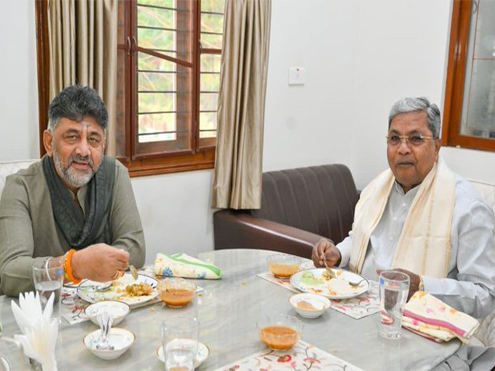 Karnataka CM and Deputy CM at breakfast meet (Photo:CMO) Karnataka CM and Deputy CM at breakfast meet (Photo:CMO)