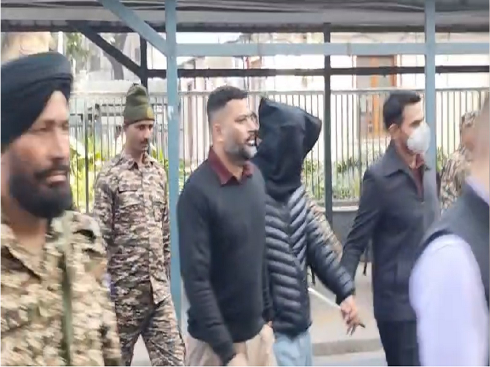 Jasir Bilal Wani being escorted from Patiala Court House (Photo/ANI) Jasir Bilal Wani being escorted from Patiala Court House (Photo/ANI)
