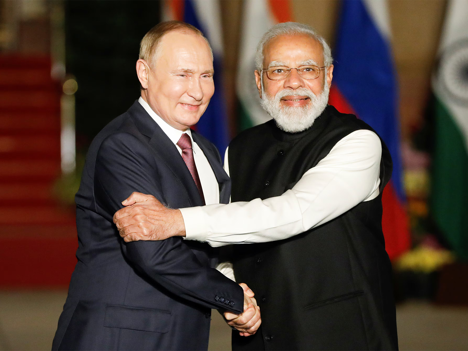 Russia’s President Vladimir Putin shakes hands with Prime Minister Narendra Modi. (Photo/Reuters)
