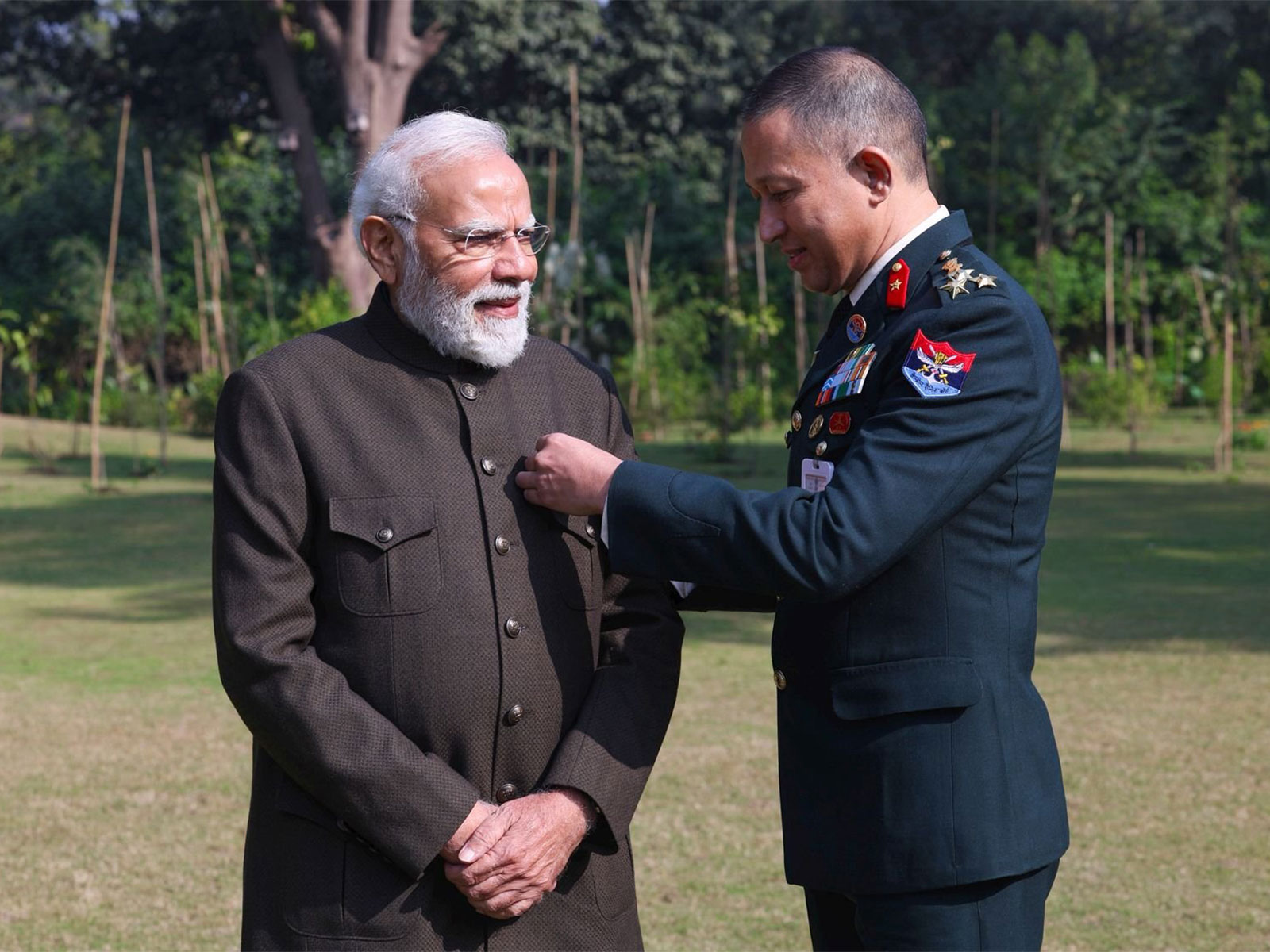 Prime Minister Narendra Modi along with a security official (Photo/X@narendramodi) 