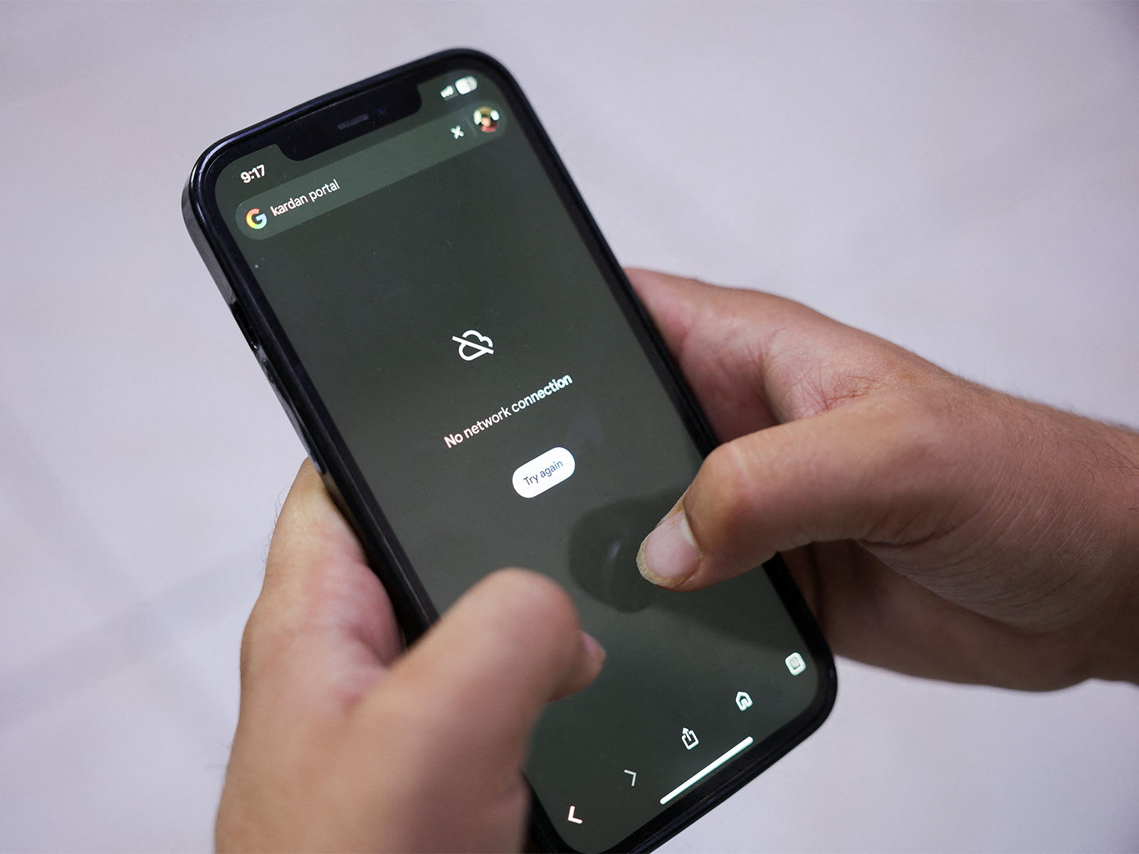 A man attempts to access Google on his smartphone during a nationwide telecom shutdown, in Kabul, Afghanistan. (Photo/Reuters) A man attempts to access Google on his smartphone during a nationwide telecom shutdown, in Kabul, Afghanistan. (Photo/Reuters)