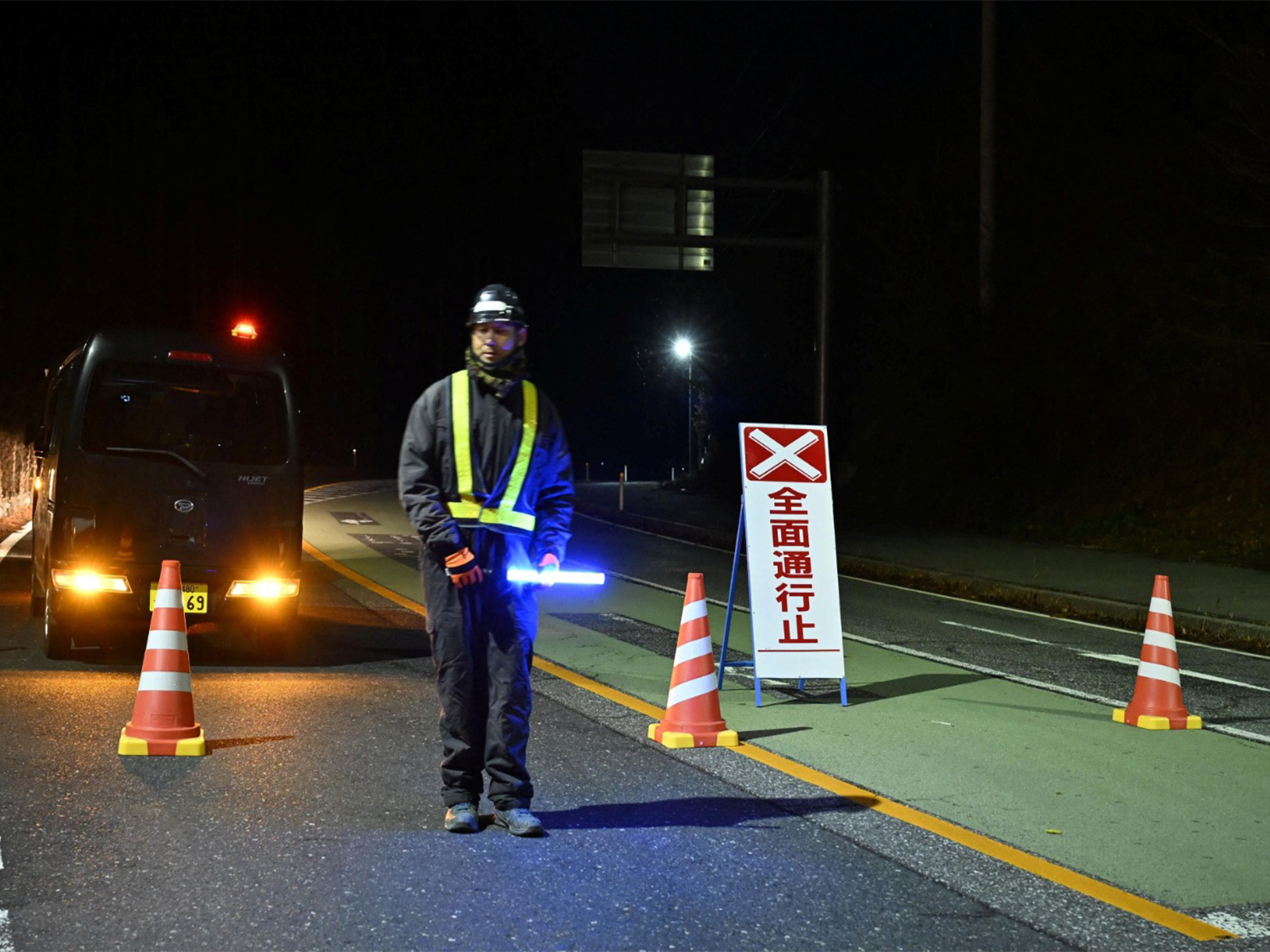 Traffic is restricted on a road following the issuance of a tsunami warning in Iwate Prefecture, Japan (Photo/ Reuters via Kyodo News) Traffic is restricted on a road following the issuance of a tsunami warning in Iwate Prefecture, Japan (Photo/ Reuters via Kyodo News)