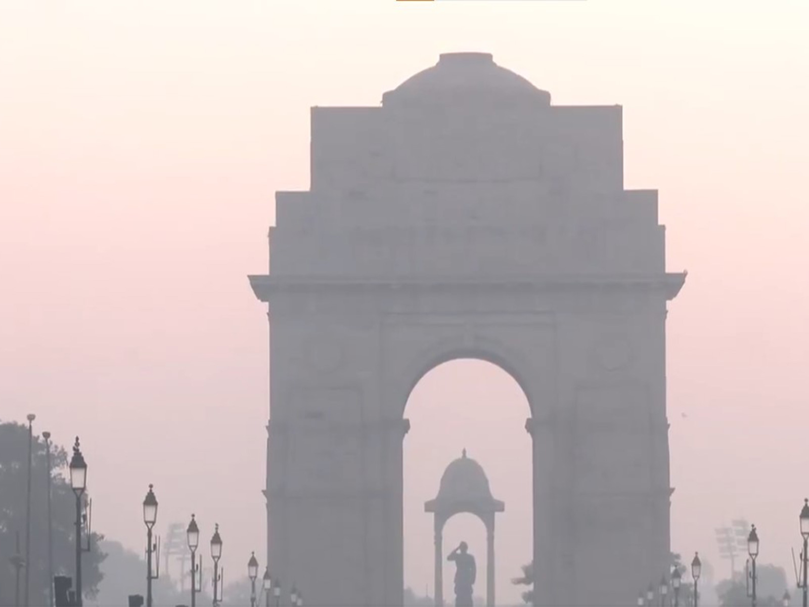 Early-morning visuals from India Gate and Kartavya Path showed iconic landmarks partially obscured behind a grey haze (Photo/ANI)