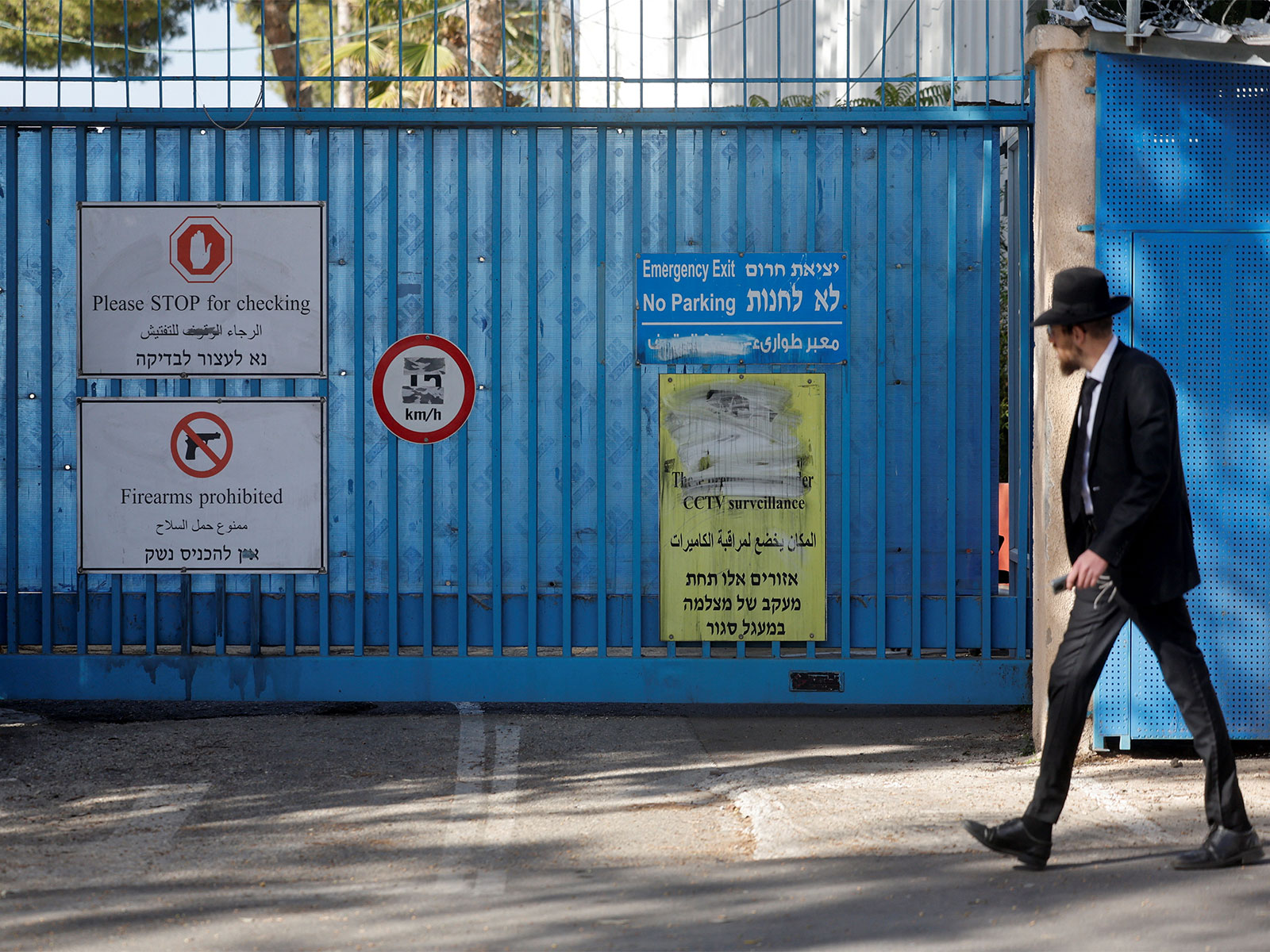 Signs are displayed at the gate of the United Nations Relief and Works Agency for Palestine Refugees (UNRWA) headquarters (Photo/Reuters) Signs are displayed at the gate of the United Nations Relief and Works Agency for Palestine Refugees (UNRWA) headquarters (Photo/Reuters)
