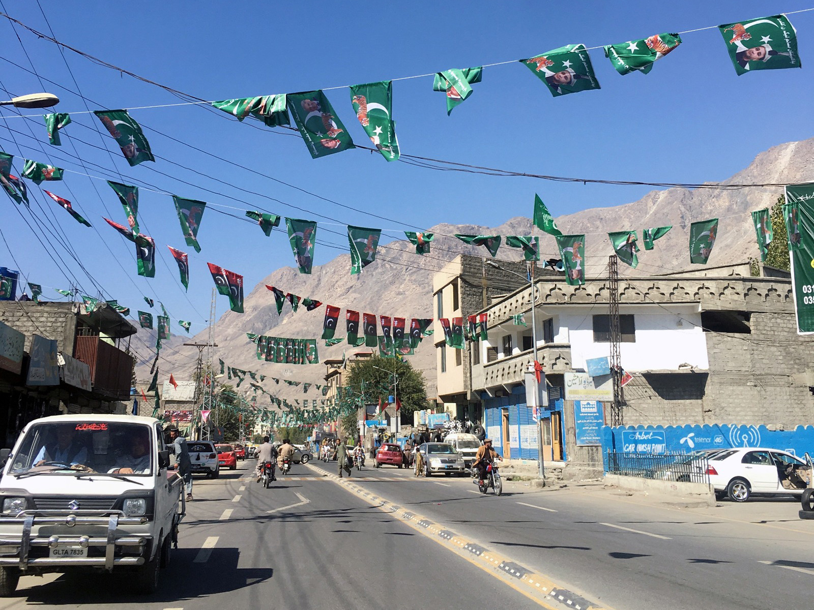 Flags of different political parties ahead of the legislative assembly elections in Gilgit (File Photo/ Reuters)
