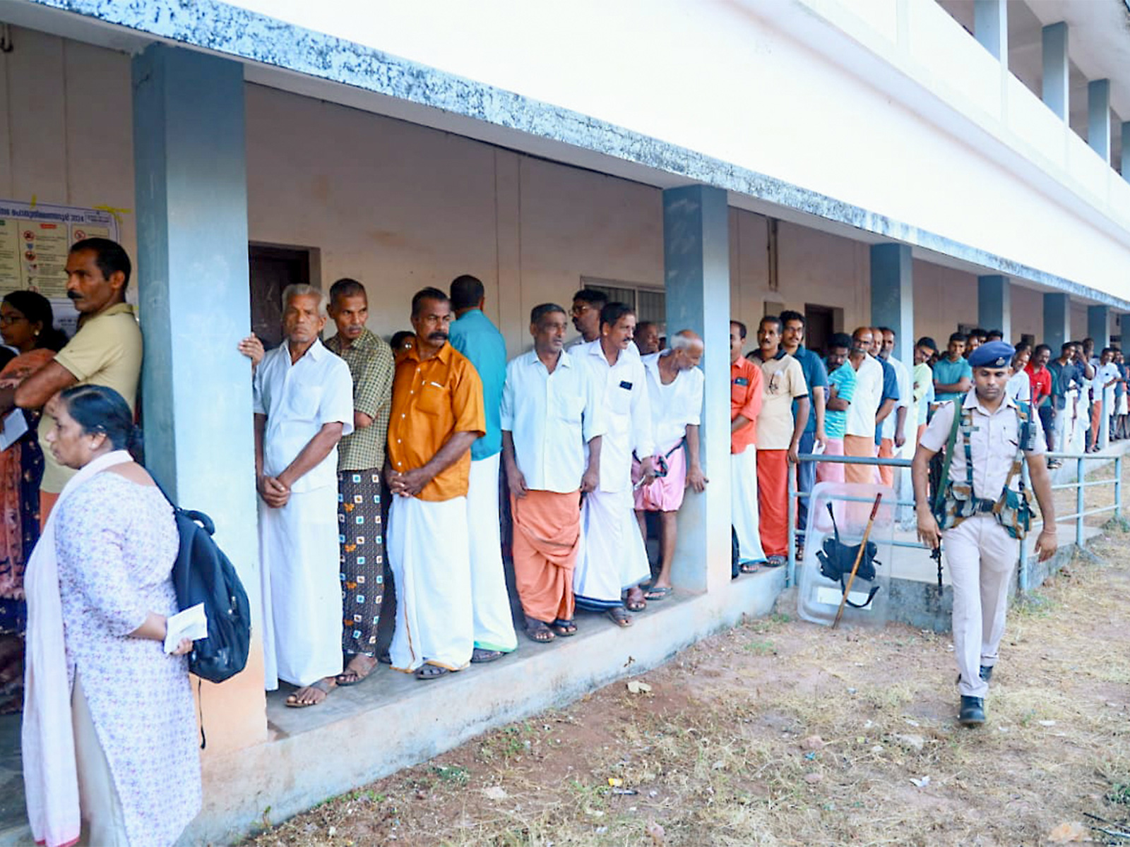 Voters wait in a queue to cast their vote (File Photo/ANI) Voters wait in a queue to cast their vote (File Photo/ANI)