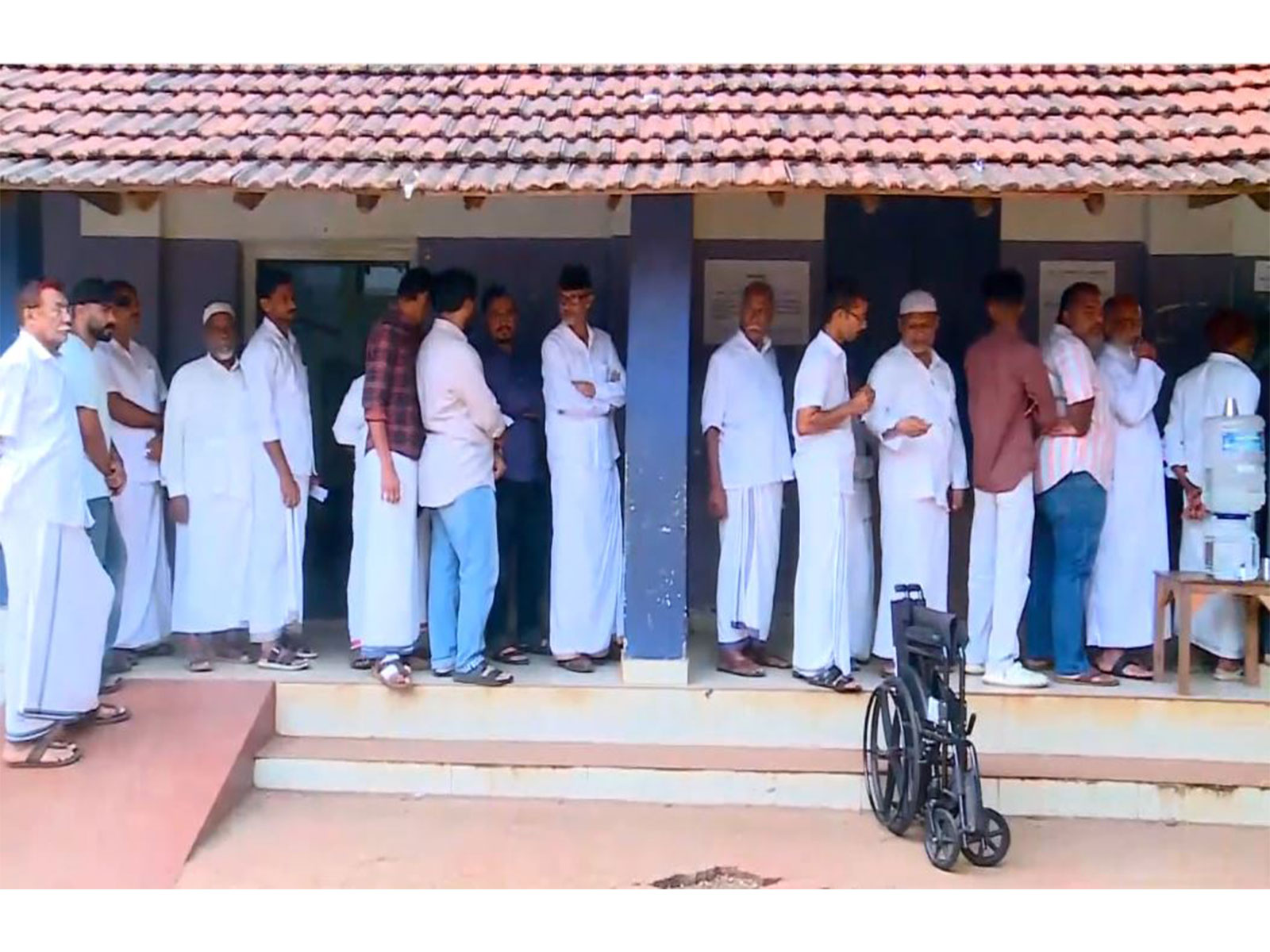 Voters queue up at Malappuram Municipality Ward 37 on December 11, 2025 (Photo/ANI)