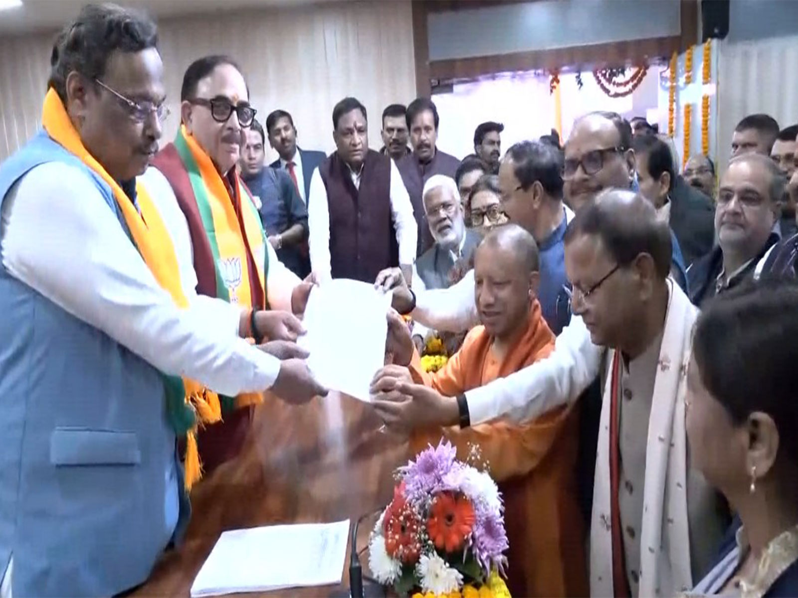 Union Minister of State for Finance Pankaj Chaudhary filing the nomination for the post of Uttar Pradesh BJP President in the presence of Chief Minister Yogi Adityanath, Deputy Chief Ministers Keshav Prasad Maurya and Brajesh Pathak (Photo/ANI)