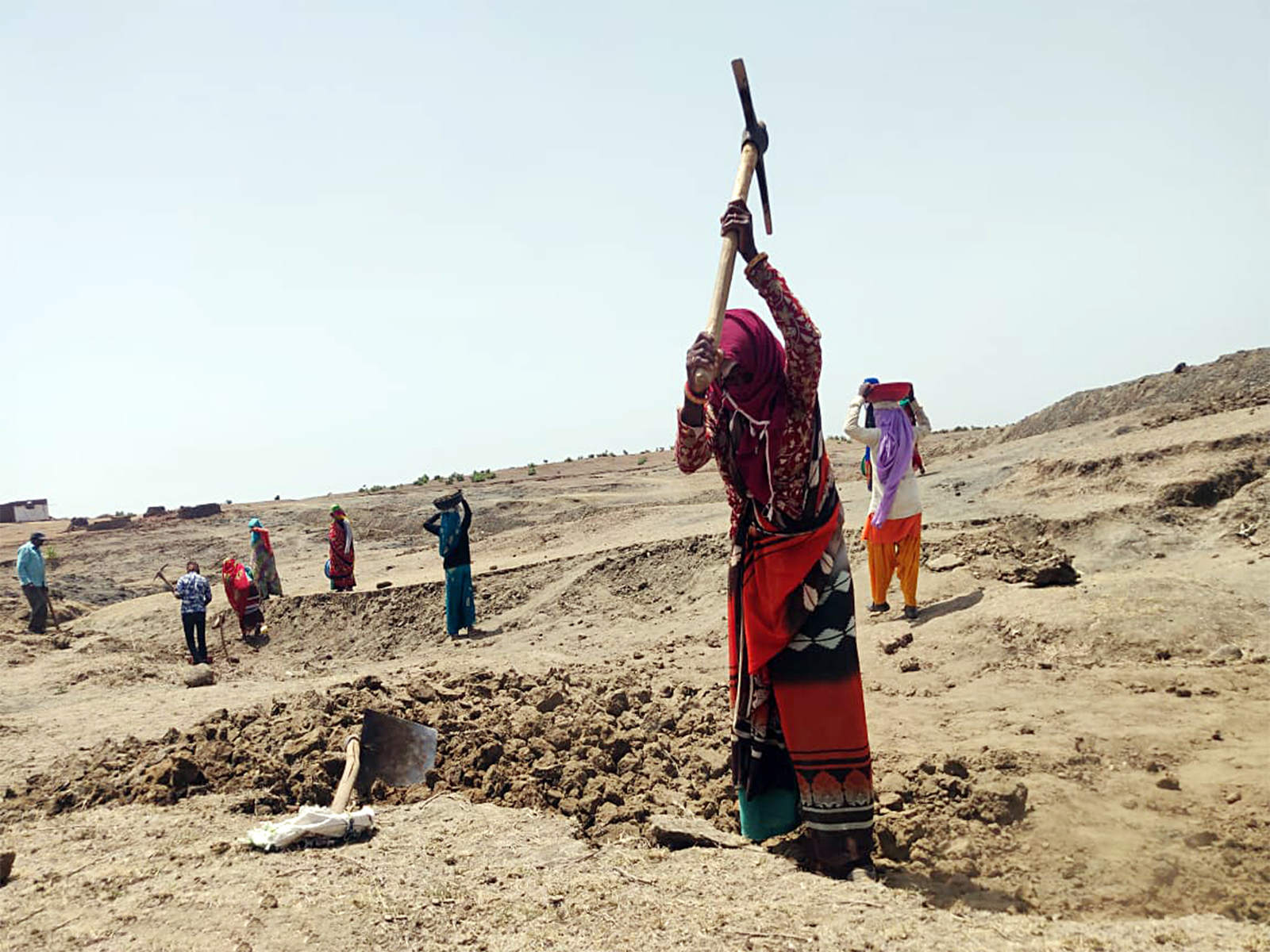 People are working under MGNREGA scheme to earn their livelihood. (Photo/ANI)