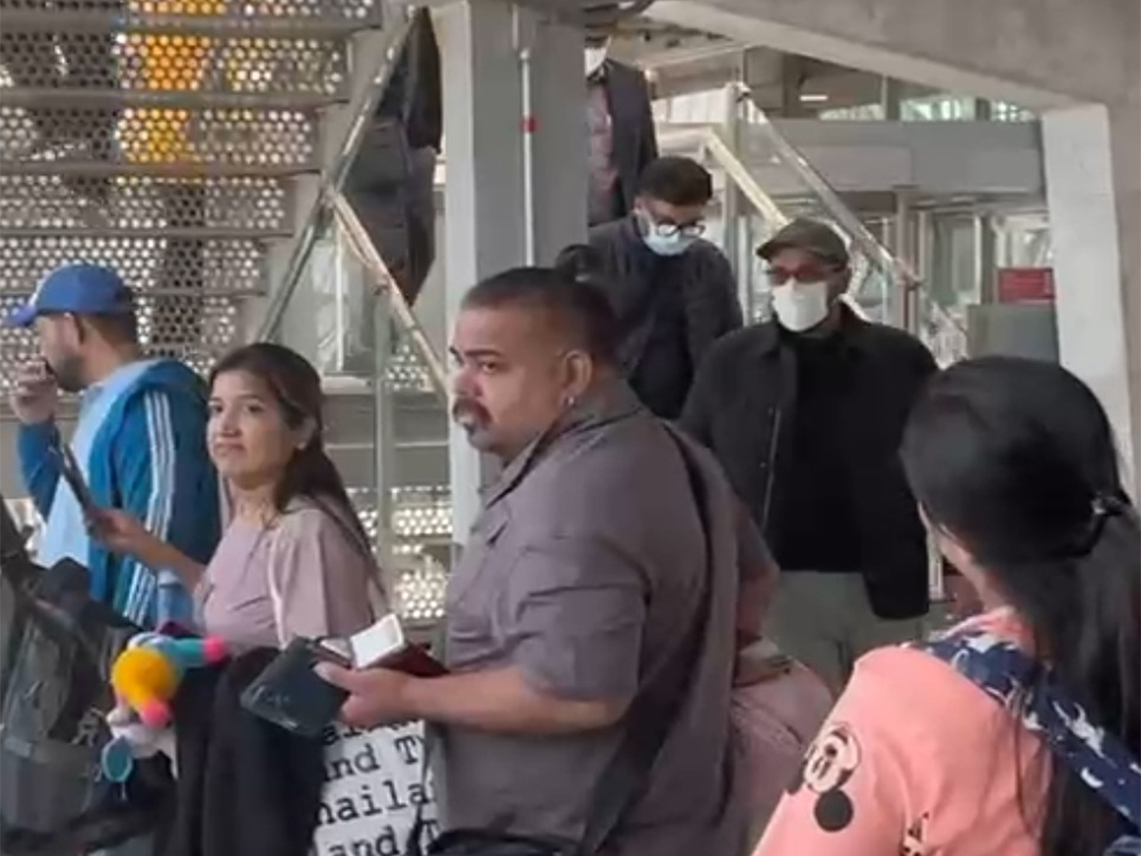 Luthra brothers (wearing surgical masks) at Bangkok Airport (Photo/ANI)