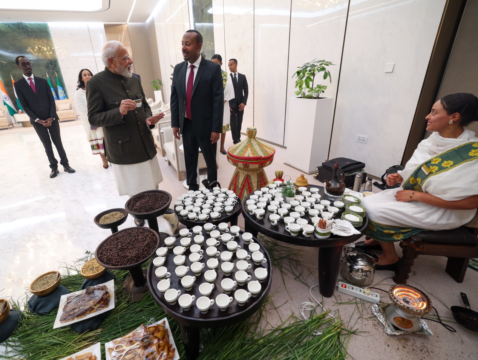 PM Modi participating in traditional Ethiopian coffee ceremony with Ethiopian counterpart Abiy Ahmed Ali at Addis Ababa airport. (Photo: X/@narendramodi) (Photo/ANI) PM Modi participating in traditional Ethiopian coffee ceremony with Ethiopian counterpart Abiy Ahmed Ali at Addis Ababa airport. (Photo: X/@narendramodi) (Photo/ANI)
