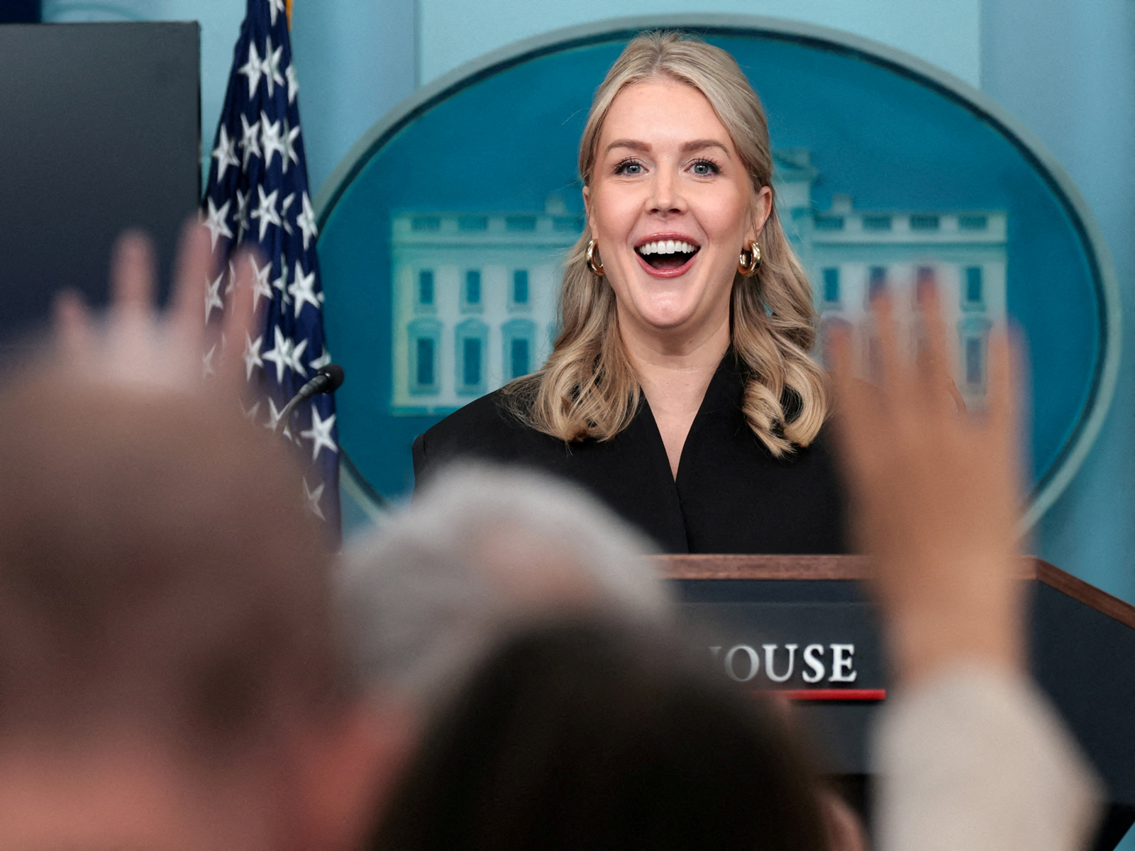 Hands are raised as White House press secretary Karoline Leavitt reacts during a press briefing at the White House (Photo/Reuters)