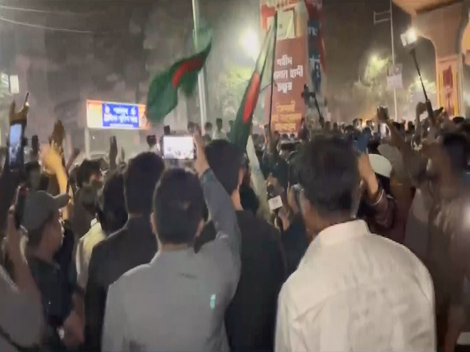 Protesters block roads and chant slogans at the Shahbagh intersection in Dhaka following the death of activist Osman Hadi. (Photo/ANI)