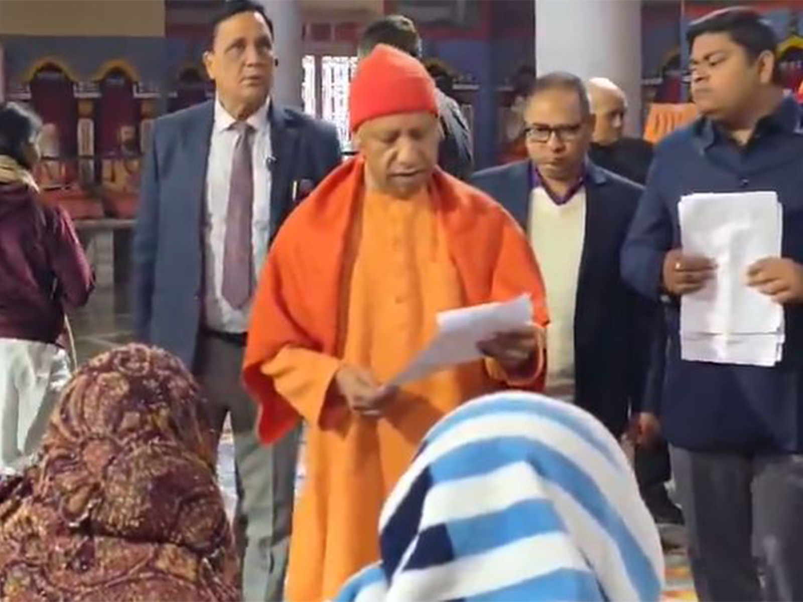 Yogi Adityanath interacting with citizens during ‘Janata Darshan’ at Gorakhnath Temple. (Photo/ @myogioffice)