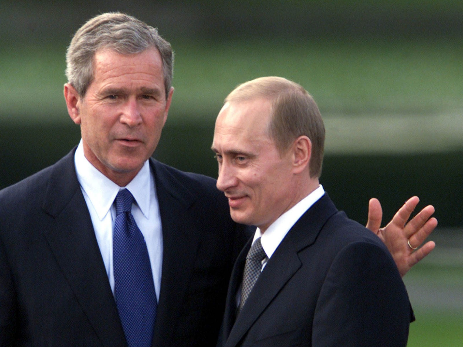 Former US President George W. Bush and Russian President Vladimir Putin (Photo/Reuters)