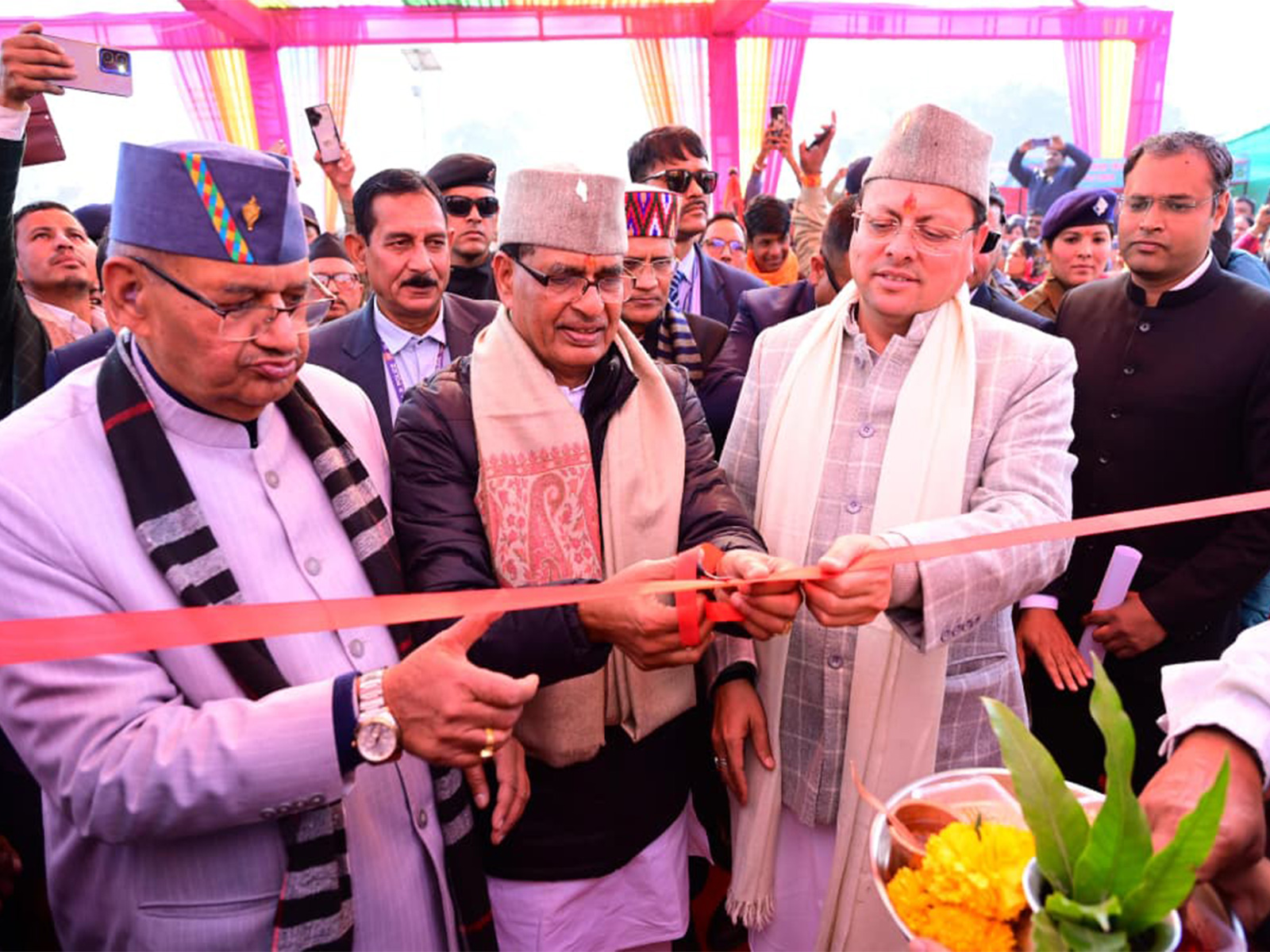 Uttarakhand CM Pushkar Singh Dhami and Union Agriculture Minister Shivraj Singh Chouhan at the state-level Farmers’ Day event in Gauchar (Photo/Uttarakhand CMO)