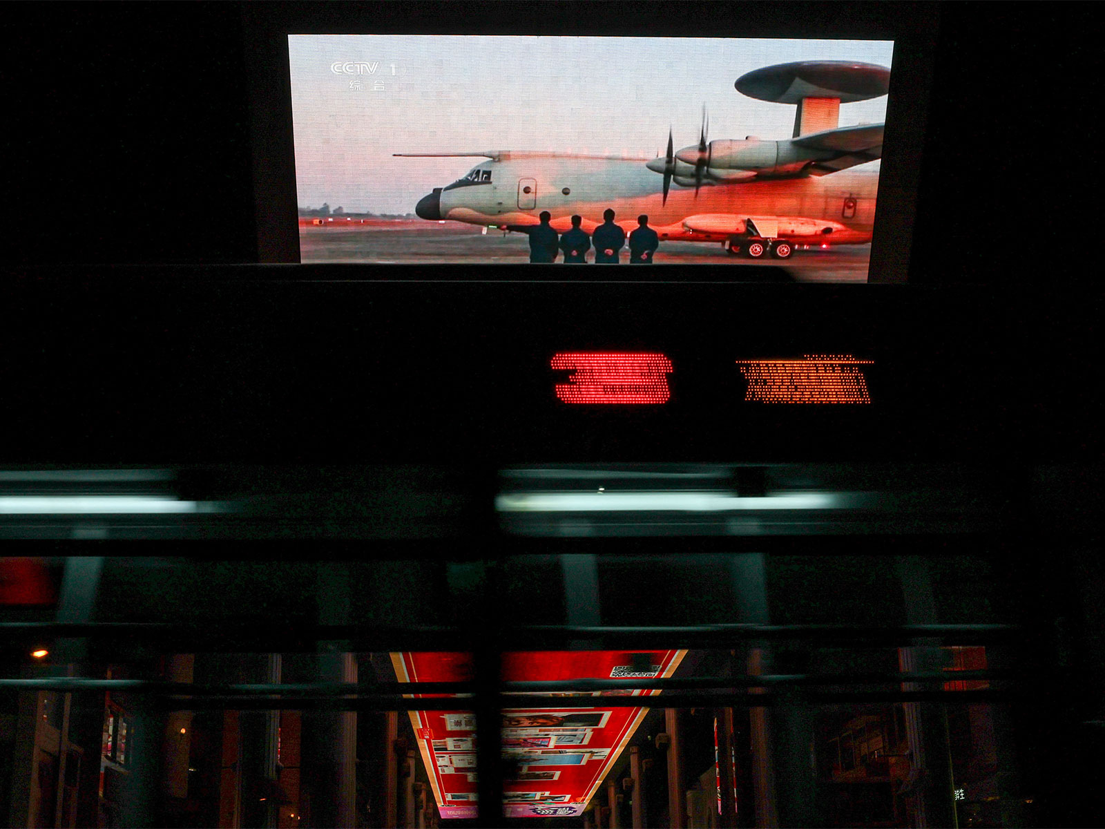 Screen showing a news report on China's military drills around Taiwan, in Beijing (Photo/ Reuters)