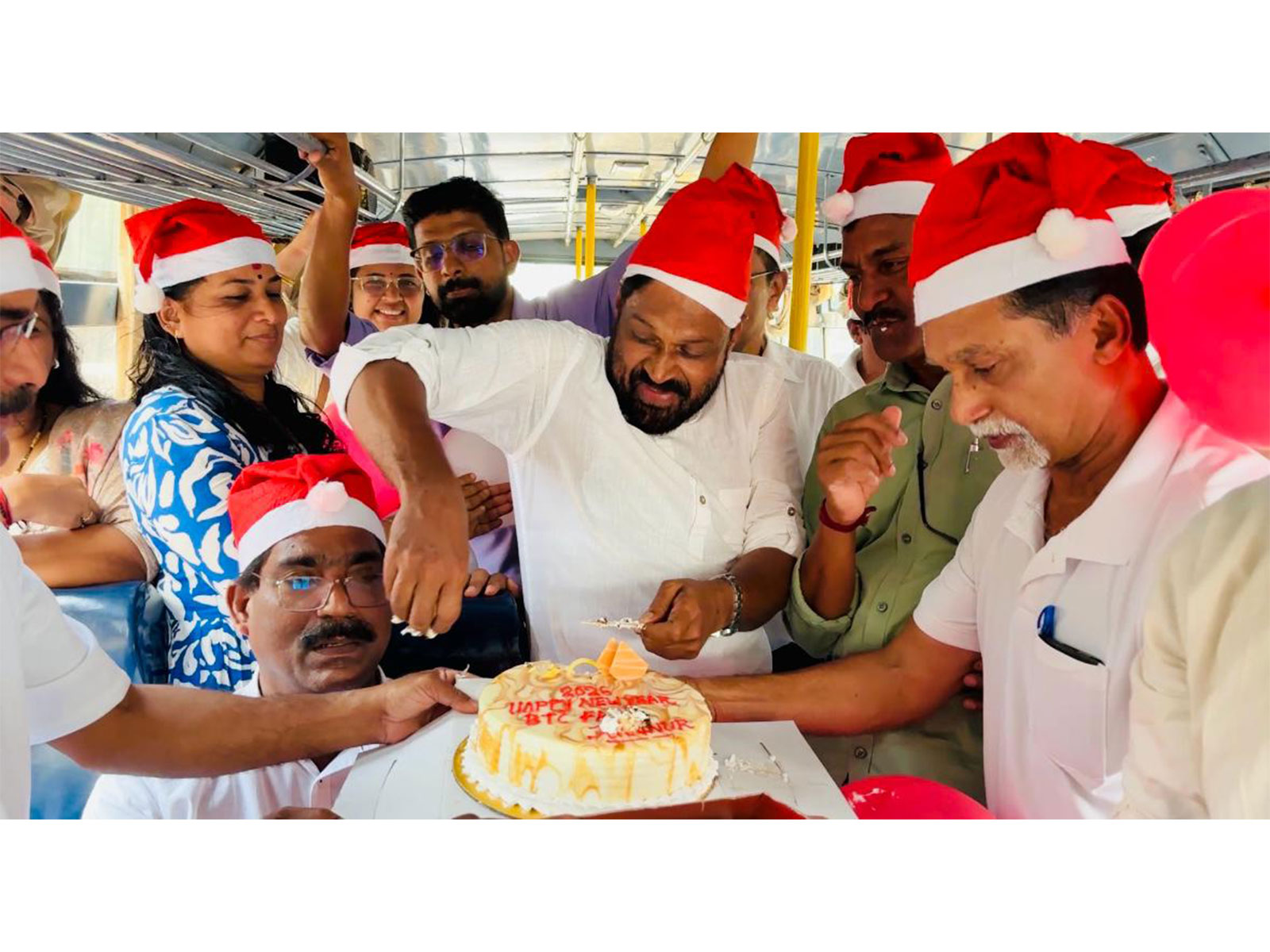 Passengers of Kerala's Kannur unit Budget Tourism Cell celebrate New Year (Photo/ANI) Passengers of Kerala's Kannur unit Budget Tourism Cell celebrate New Year (Photo/ANI)