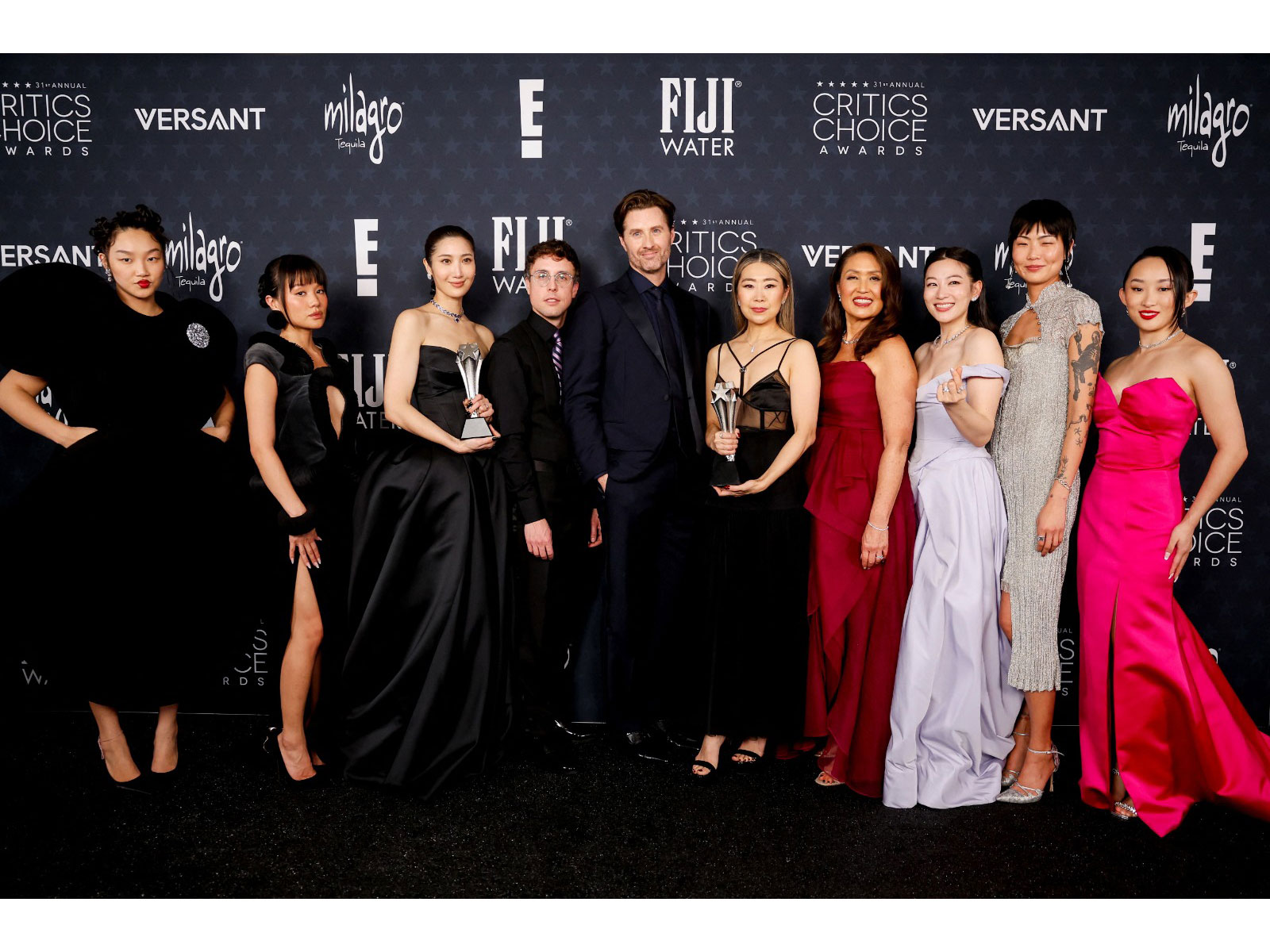 Audrey Nuna, Rei Ami, Ejae, Mark Sonnenblick, Chris Appelhans, Maggie Kang, Michelle Wong, Arden Cho, May Hong and Ji-young Yoo pose with Best Animated Feature award for 