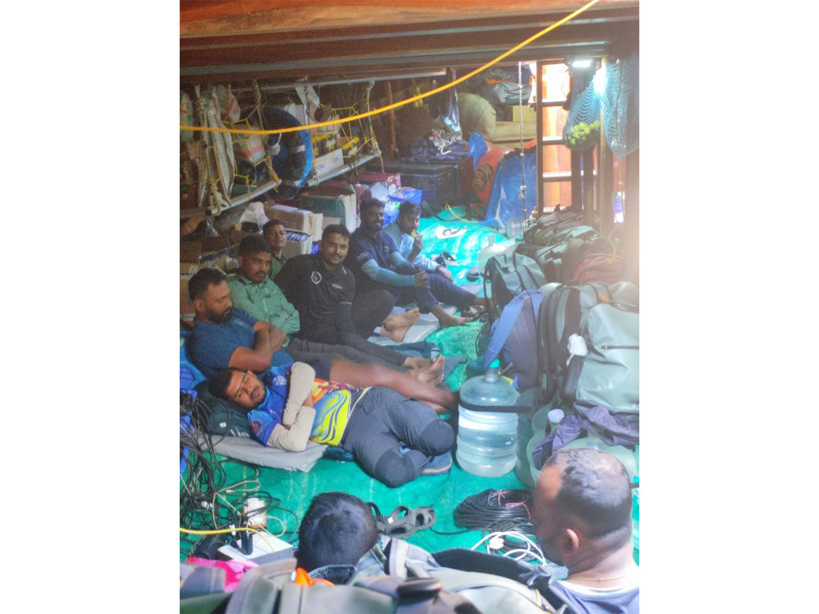 Off duty crew resting under INSV Kaundinya's deck (Photo/ X@sanjeevsanyal)