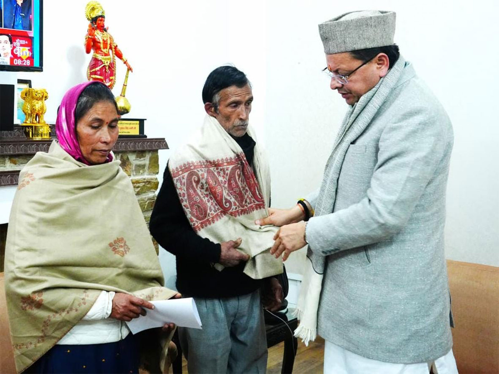 Uttarakhand CM Pushkar Dhami with parents of Ankita Bhandari (Photo/@pushkardhami) Uttarakhand CM Pushkar Dhami with parents of Ankita Bhandari (Photo/@pushkardhami)