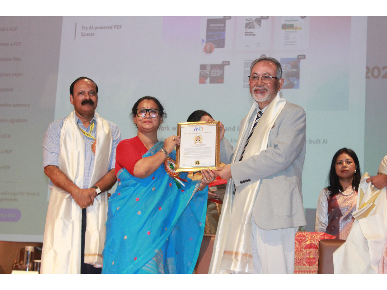 Dr. Nomal Chandra Borah receiving the ANEI Lifetime Achievement Award from Ms. Loni Borpatra Gohain (Government of Assam) in the presence of Prof. Ashok Puranik (AIIMS Guwahati) Dr. Nomal Chandra Borah receiving the ANEI Lifetime Achievement Award from Ms. Loni Borpatra Gohain (Government of Assam) in the presence of Prof. Ashok Puranik (AIIMS Guwahati)