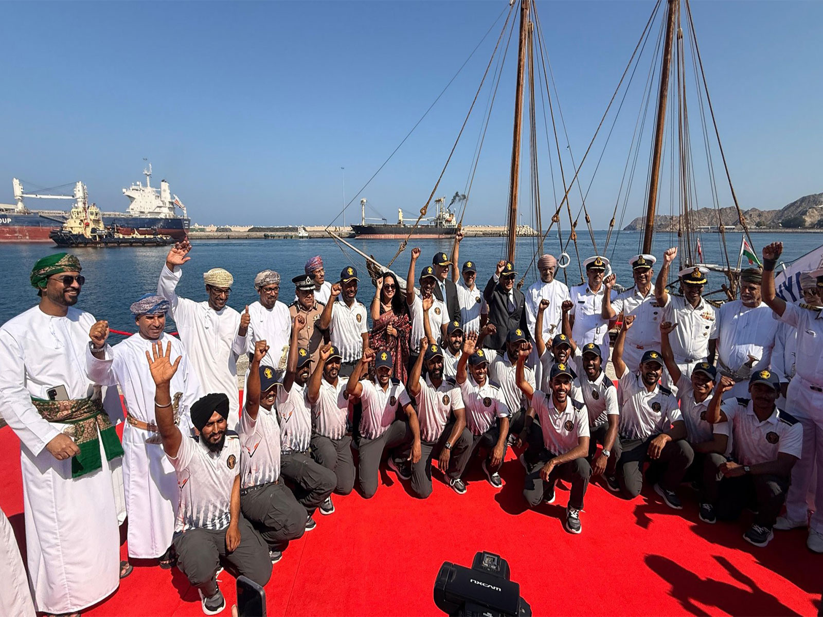 Crew members of Indian Naval Sailing Vessel (INSV) Kaundinya pose for a group photograph after the vessel’s maiden voyage from Porbandar to Muscat. (Photo: X/@MEAIndia)