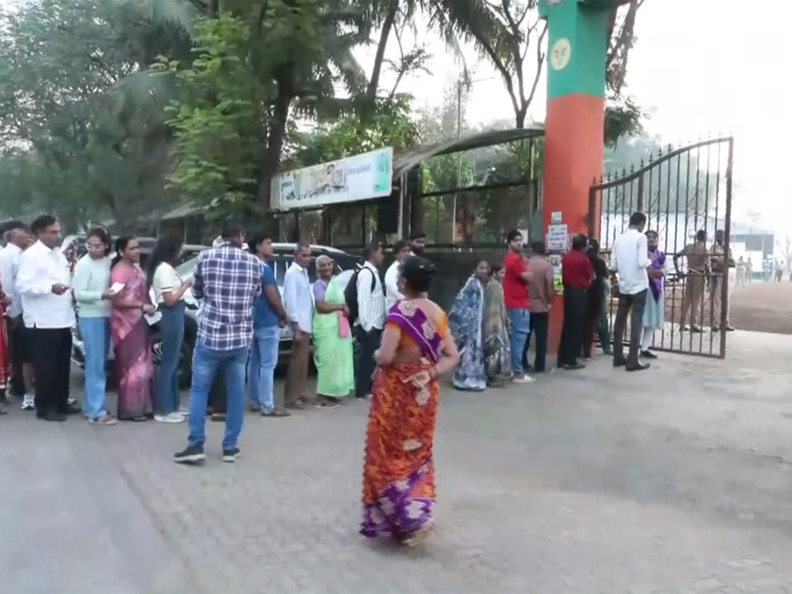 Voters queue up to cast their votes in BMC polls (Photo/ANI)