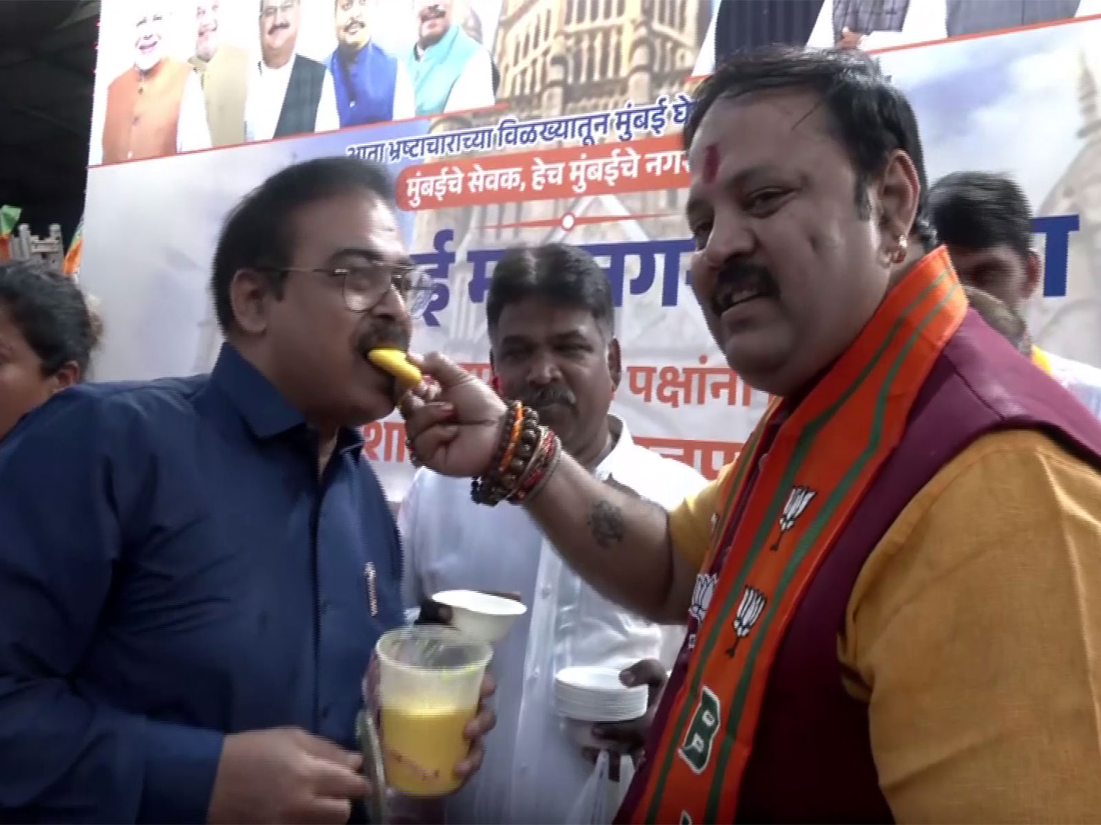 Mumbai BJP chief spokesperson Niranjan Shetty distributes rasmalai (Photo/ANI)