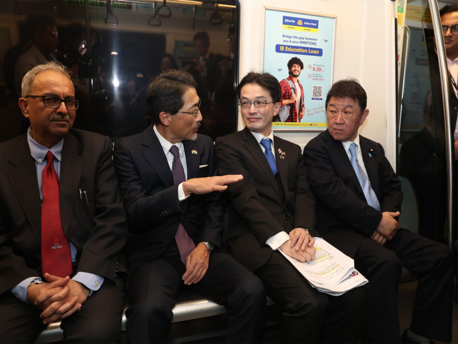 Japanese Foreign Minister Motegi takes a ride in Delhi Metro (Photo/DMRC) Japanese Foreign Minister Motegi takes a ride in Delhi Metro (Photo/DMRC)