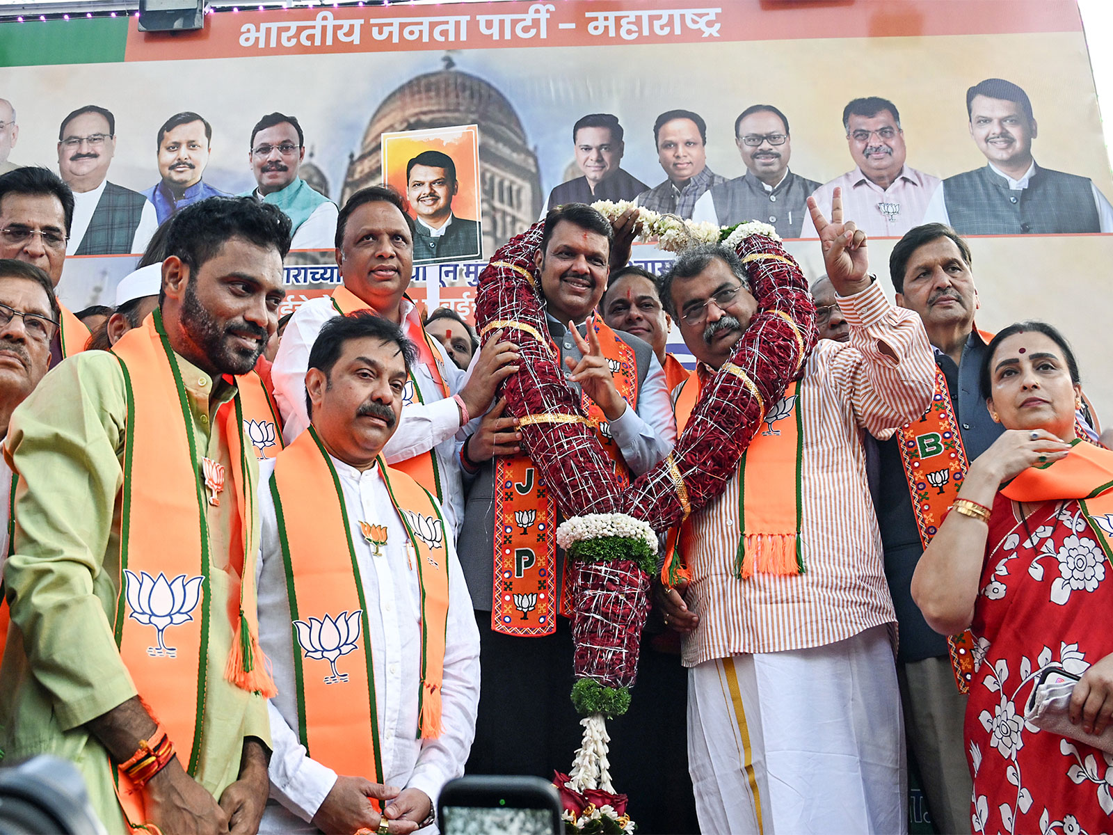 Maharashtra Chief Minister Devendra Fadnavis with BJP state president Ravindra Chavan being garlanded after Bharatiya Janata Party wins the Municipal Corporation elections (File Photo/ANI)