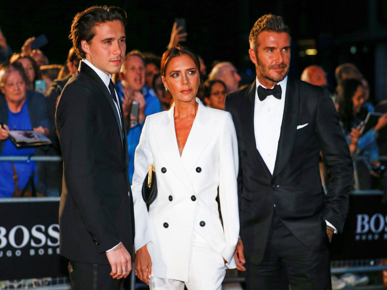 Brooklyn Beckham with David Beckha, Victoria Beckham (Image source: Reuters)