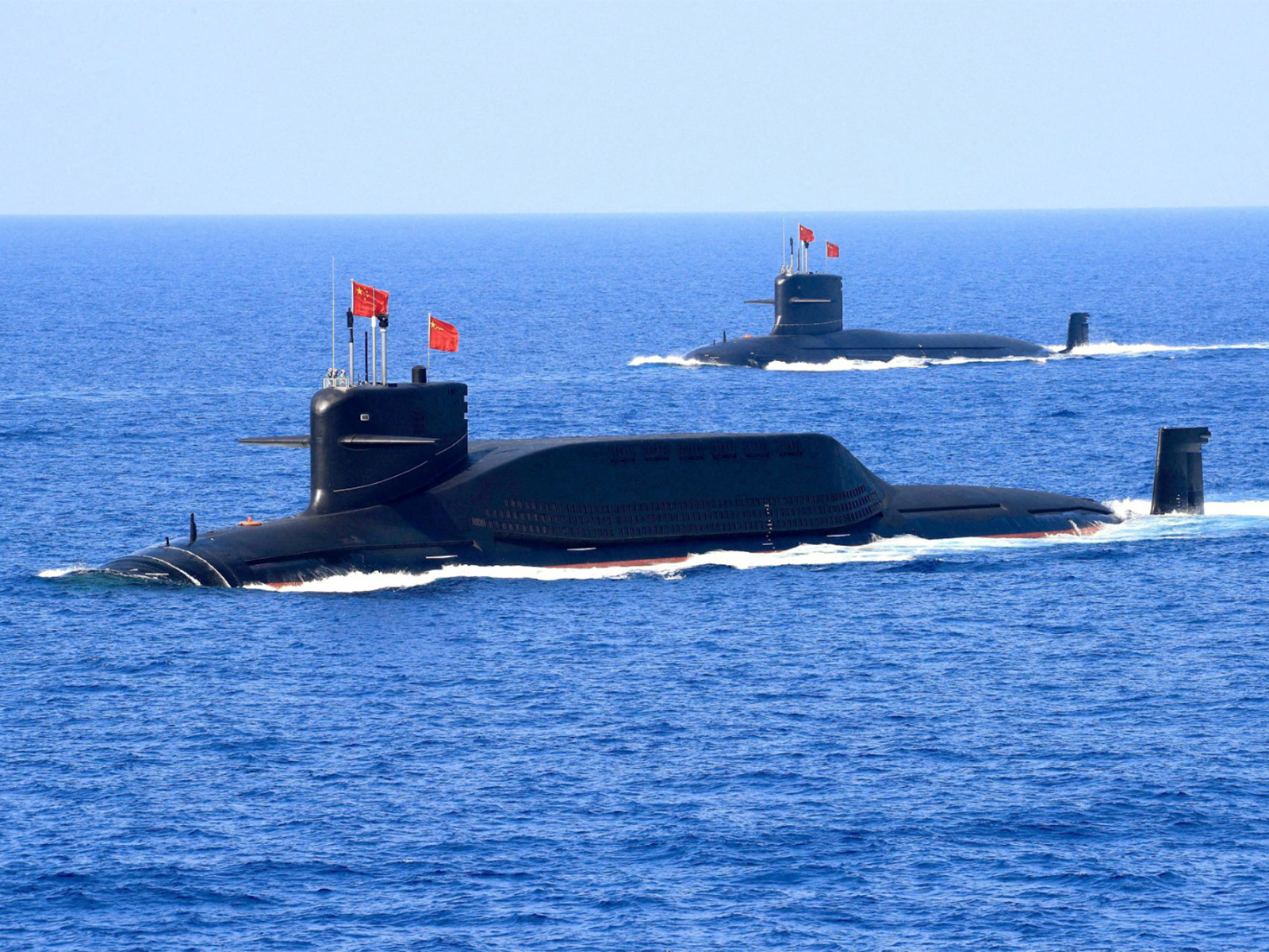 A nuclear-powered Type 094A Jin-class ballistic missile submarine of the Chinese People's Liberation Army Navy navigates during a military display in the South China Sea (File Photo/Reuters)