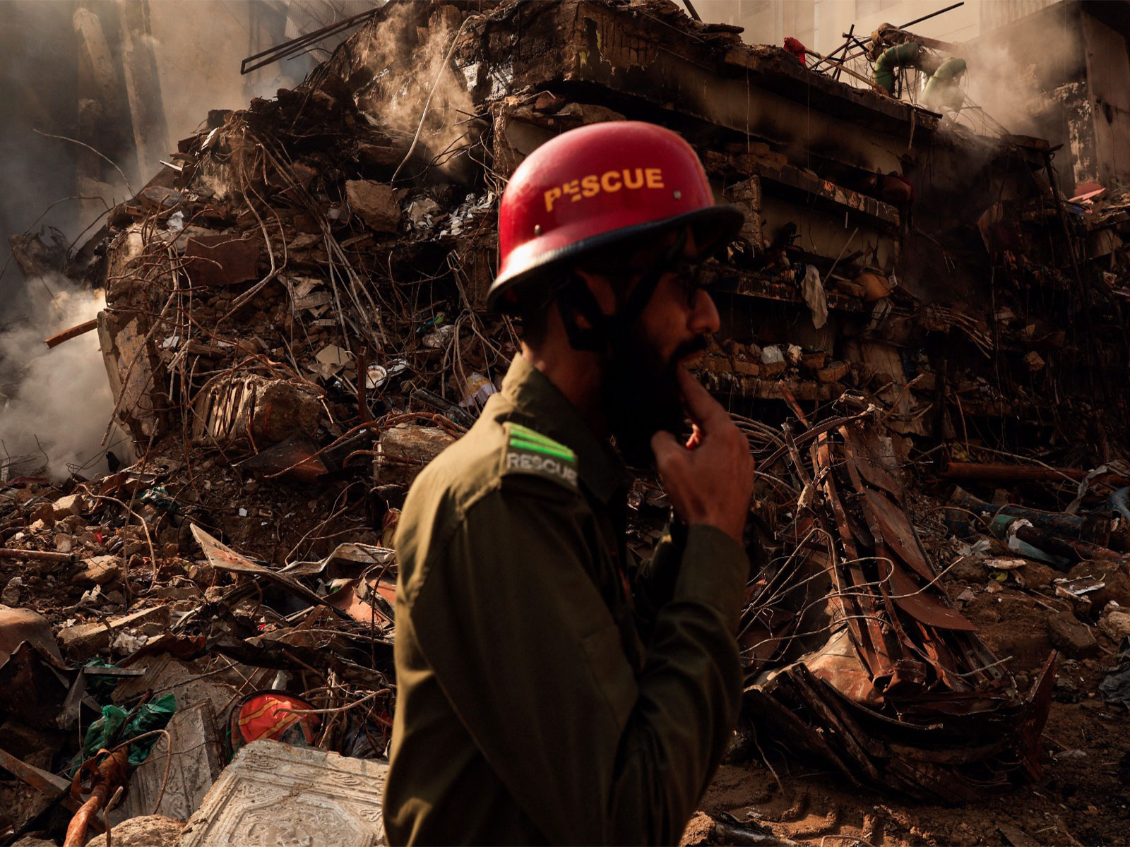 Rescue operations at at Gul Plaza in Karachi (Photo/Reuters) Rescue operations at at Gul Plaza in Karachi (Photo/Reuters)
