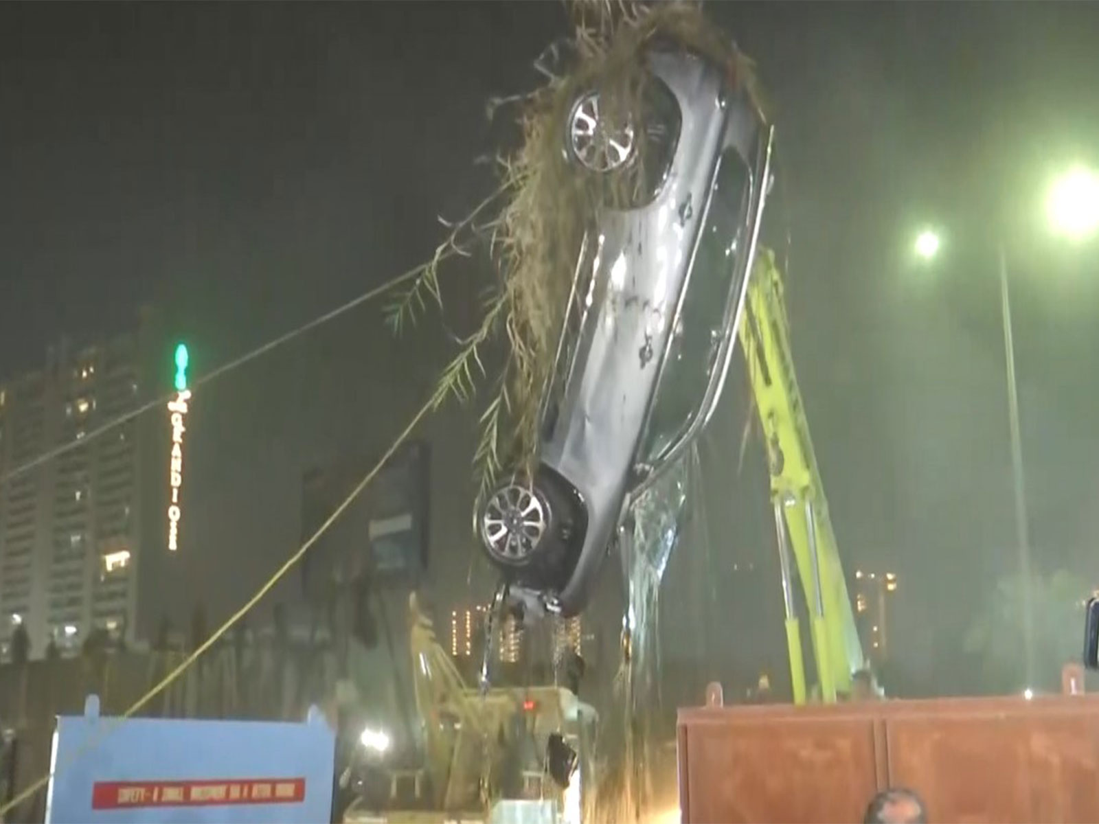NDRF teams retrieve the car of the victim Yuvraj Mehta (Photo/ANI)