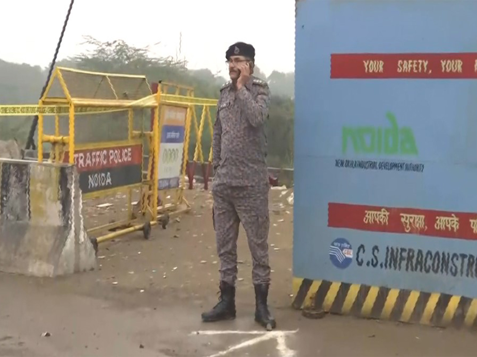 NDRF personnel at the site where Yuvraj Mehta's car  fell into a water-filled pit in Greater Noida. (Photo/ANI)