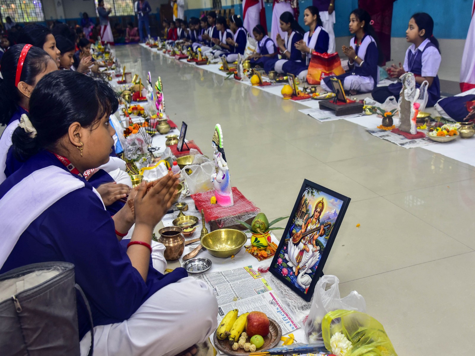 Students offer prayers to goddess Saraswati on Basant Panchami (Photo/ANI)