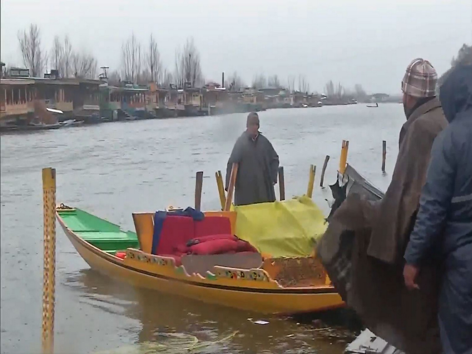Shikaras damaged as gusty winds hit Srinagar’s Dal Lake (Photo/ANI)
