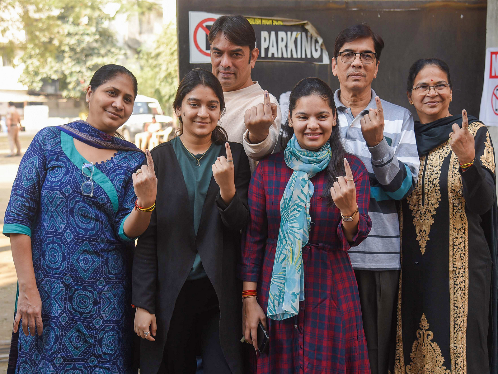 Voters show their ink-marked finger after casting their vote (File Photo/ANI)