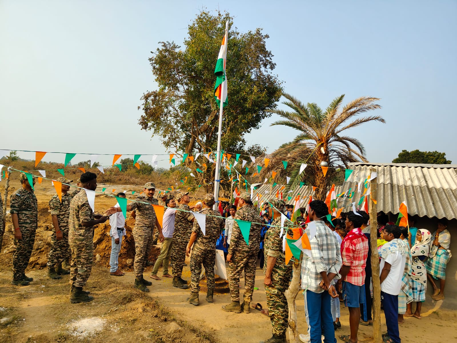 Security forces unfurls flag at Chhattisgarh's Gogunda village (Photo/ ANI) Security forces unfurls flag at Chhattisgarh's Gogunda village (Photo/ ANI)