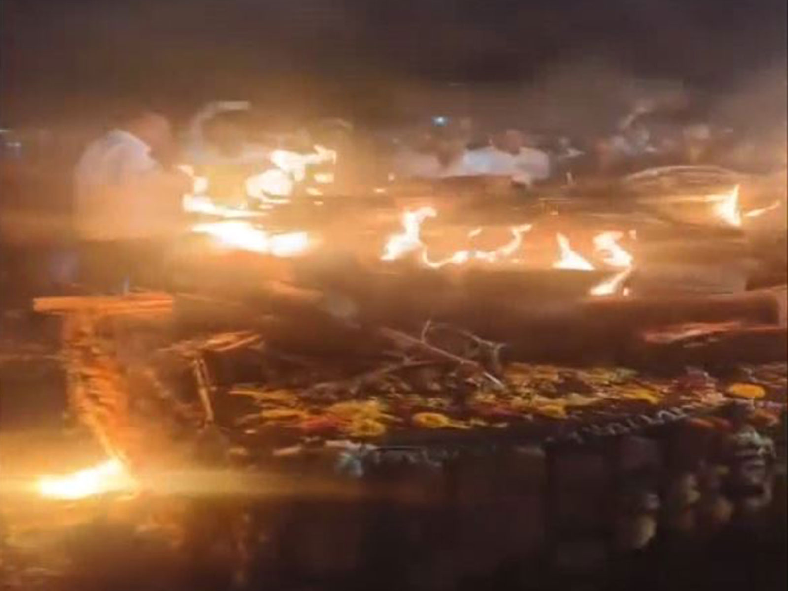 The last rites of Vidip Dilip Jadhav, the personal security officer (PSO) of Deputy CM Ajit Pawar, were performed by his family in their native village in Satara last night. (Photo/ANI)