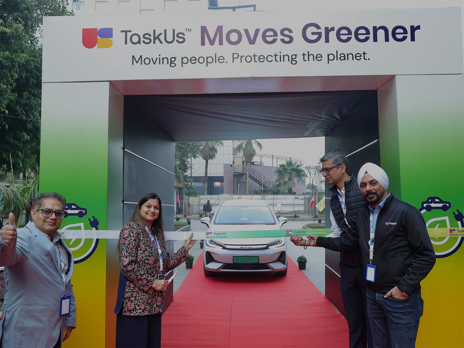 Sapna Bhambani, SVP of Operations and Country Leader, India at TaskUs, unveils the company’s new EV transportation program in Gurugram, advancing greener commutes and reducing carbon emissions