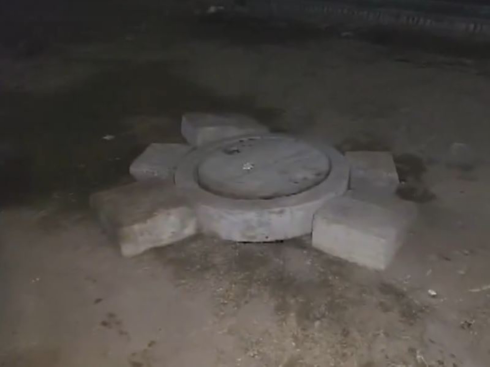 Visuals from Rohini Sector 32 showing the spot where a man fell into an open drain. (Photo/ANI)