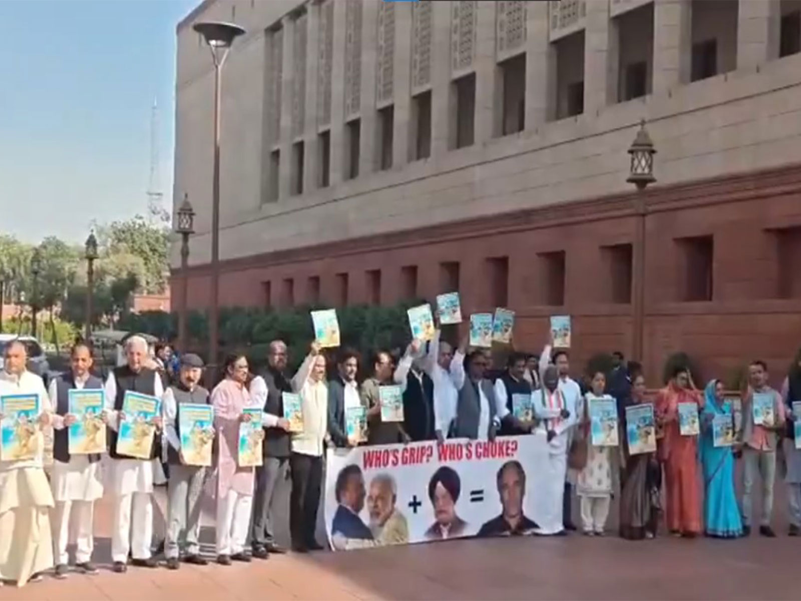Opposition MPs protest outside Parliament building (Photo: ANI)