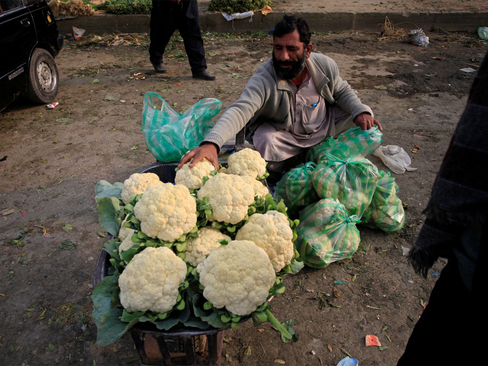 Vegetable seller in Pakistan (File Photo/ Reuters) Vegetable seller in Pakistan (File Photo/ Reuters)
