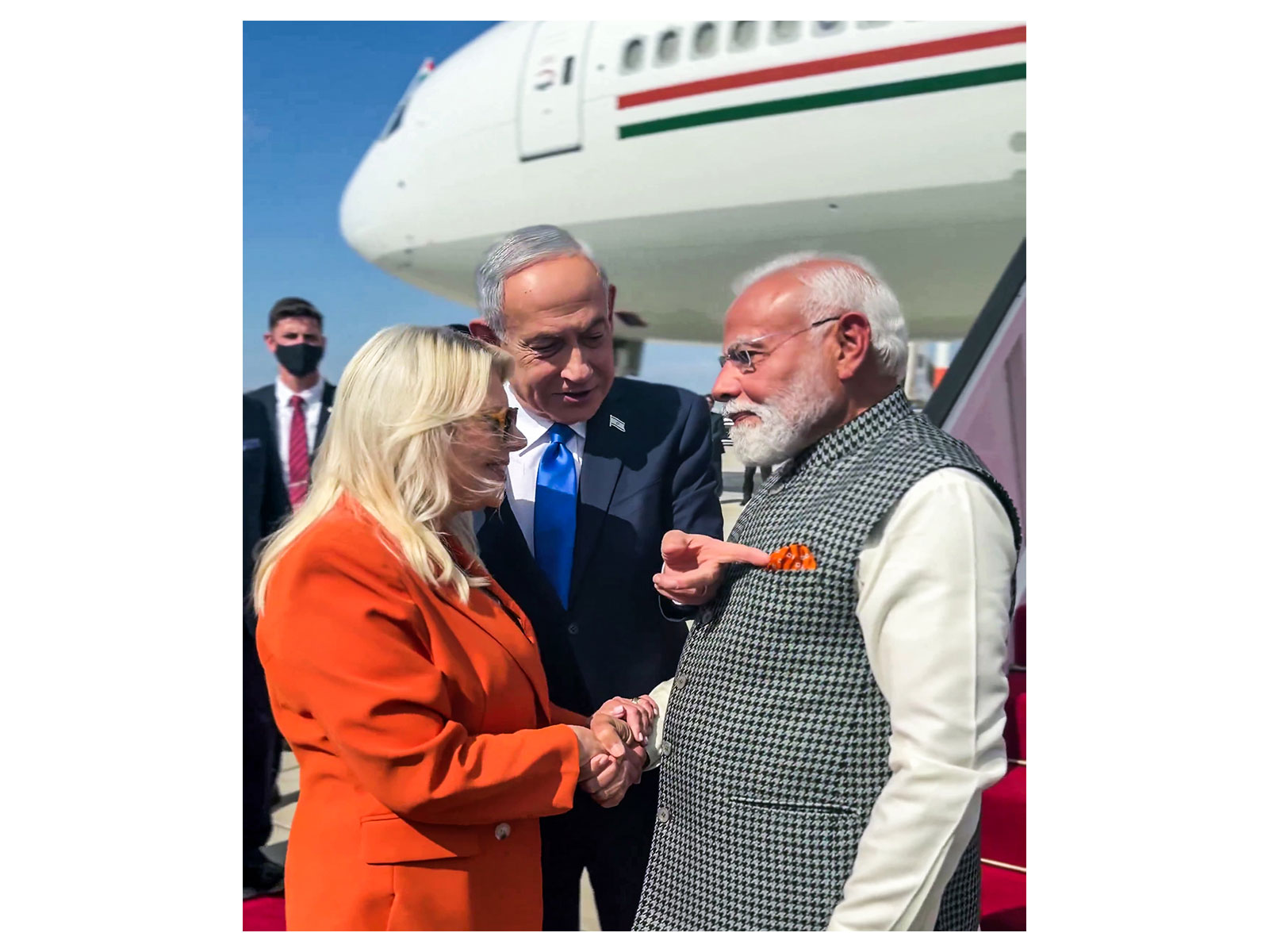 Israel PM Benjamin Netanyahu points to matching colour of his wife  Sara Netanyahu’s outfit and PM Modi's pocket square (Photo/ANI)