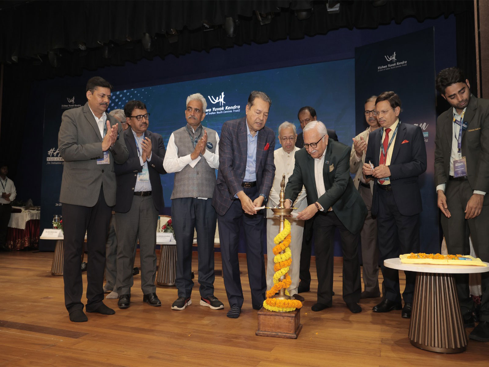 Inaugural lamp lighting at Vishwa Yuvak Kendra’s Aahvaan 2026, symbolising shared commitment to collaboration, impact, and inclusive development