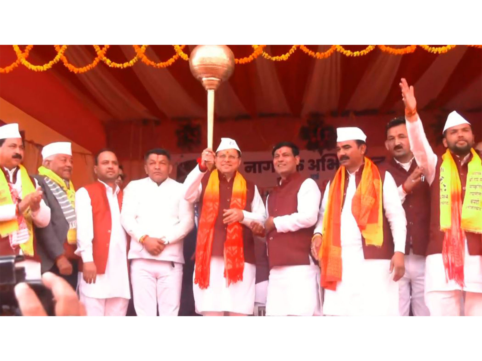 CM Pushkar Singh Dhami joins Kali Kumaon Holi Rang Mahotsav (Photo/ANI) CM Pushkar Singh Dhami joins Kali Kumaon Holi Rang Mahotsav (Photo/ANI)