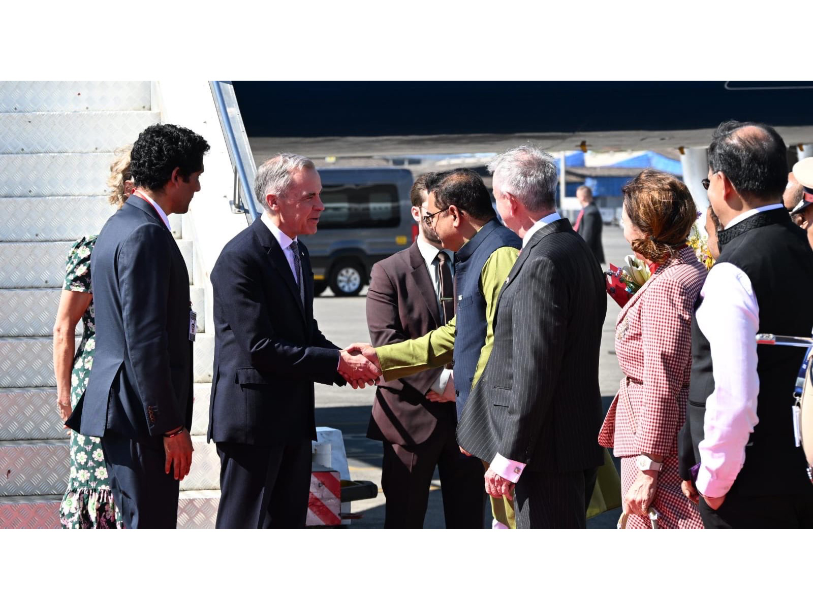 Canadian Prime Minister Mark Carney and his wife, Diana Fox Carney, are received by Maharashtra Minister Jaykumar Rawal upon their arrival in Mumbai during his first official visit to India. (Photo: X/@MEAIndia)