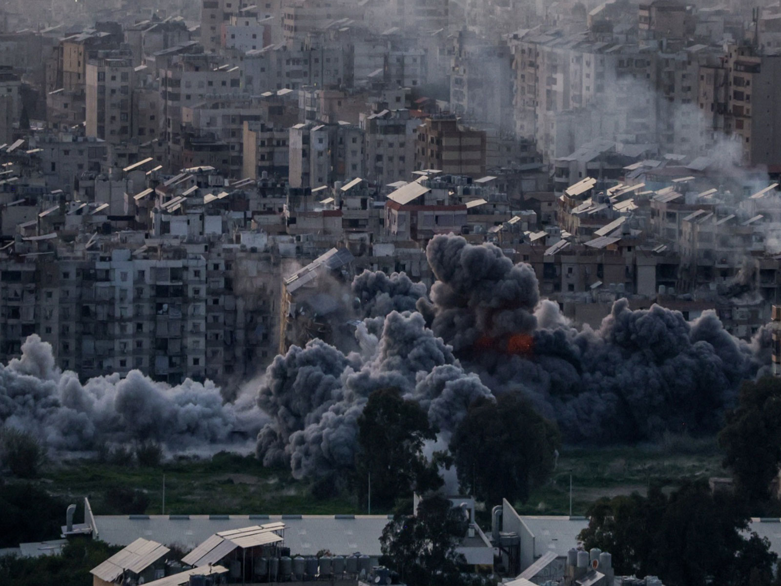 Smoke rises after an Israeli strike on Beirut's southern suburbs (Photo/Reuters)